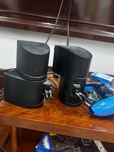 2 bose speakers