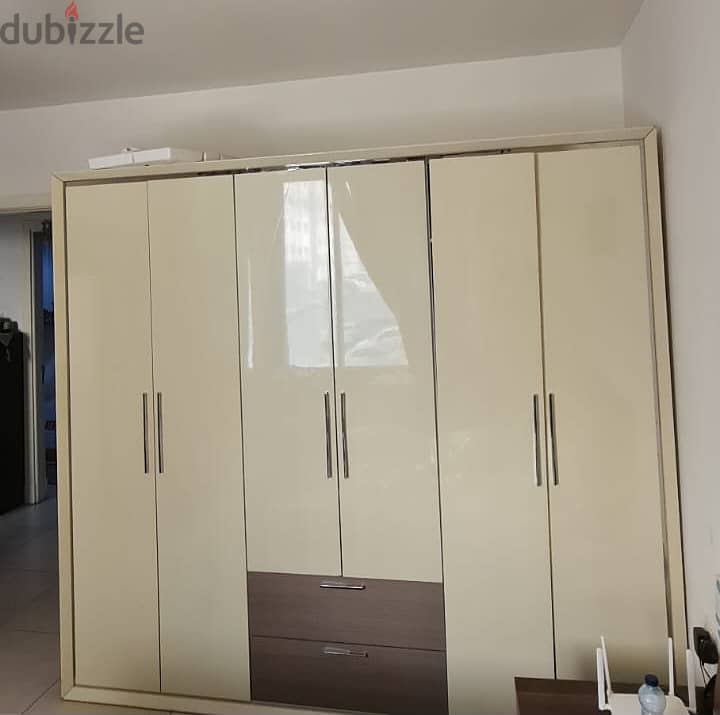 The home center cupboard for sale is in perfect condition 0