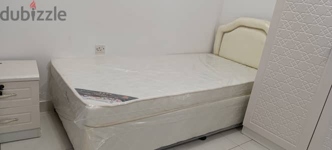 Bed with mattress