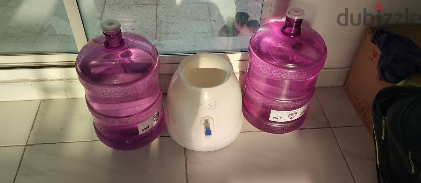 Water dispensers with 2 water bottle filled 4