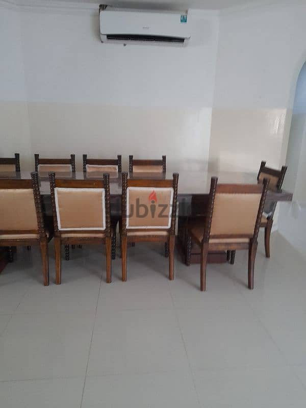 during table for sale 100 rials 8 chairs 0