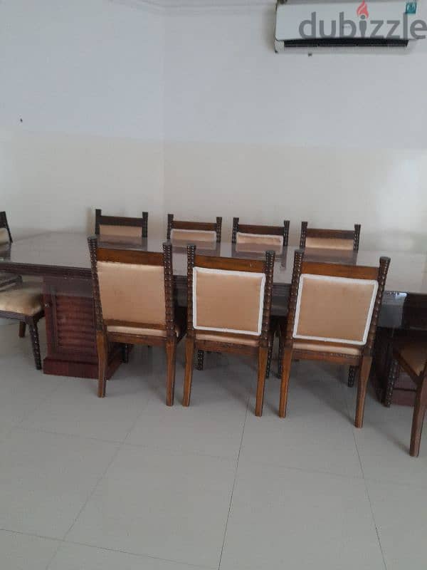 during table for sale 100 rials 8 chairs 2