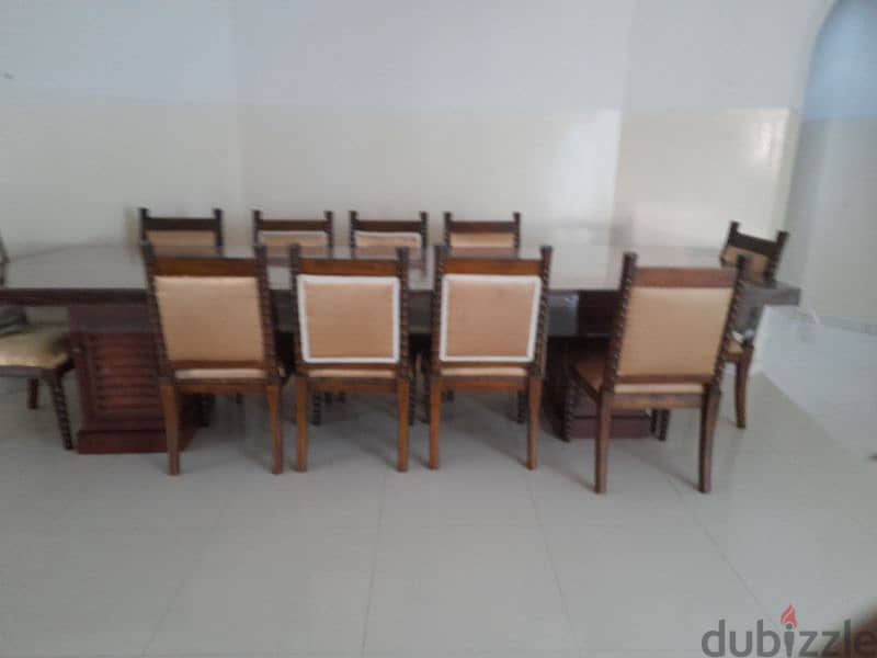 during table for sale 100 rials 8 chairs 3