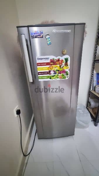 slightly used fridge 0