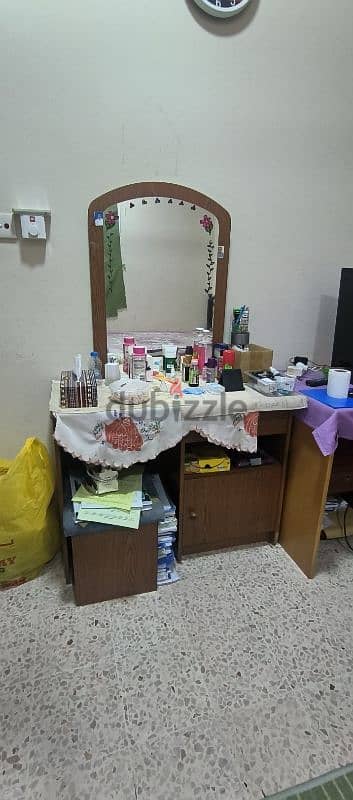 dressing table with a free wooden chair . 3