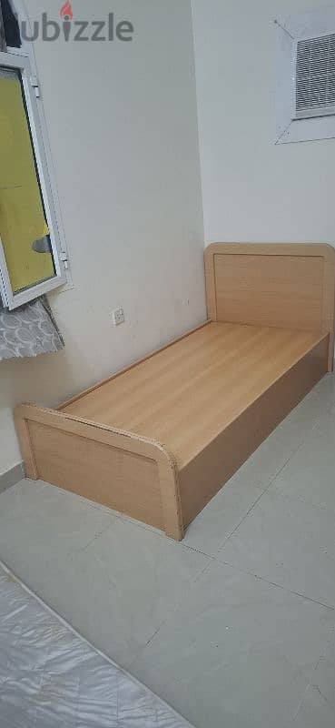 wooden bed good condition 0