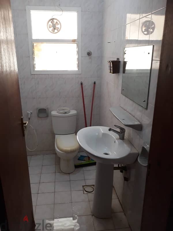 a clean room with attached bathroom for rent in a nice location 4