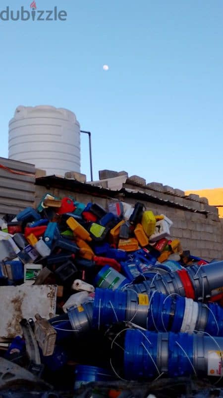 Engine Oil Can and Plastic Bucket 1