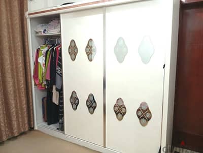 big wardrobe with 3 sliding doors