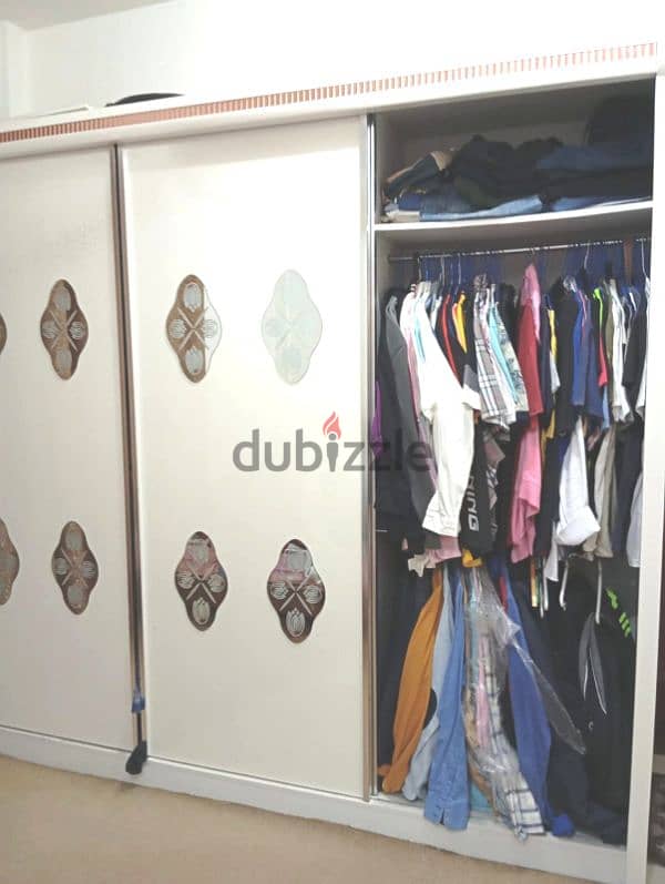 big wardrobe with 3 sliding doors 1