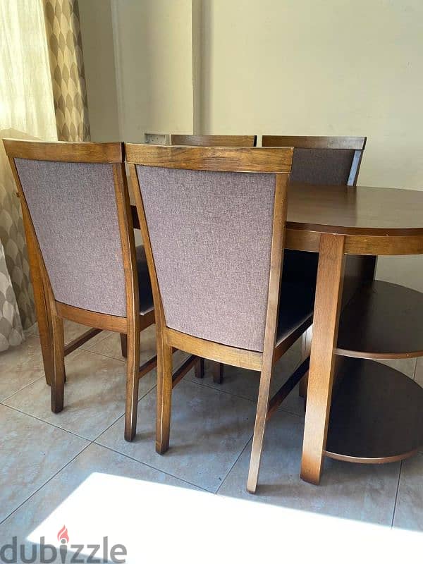 dining table with four chairs. . 1