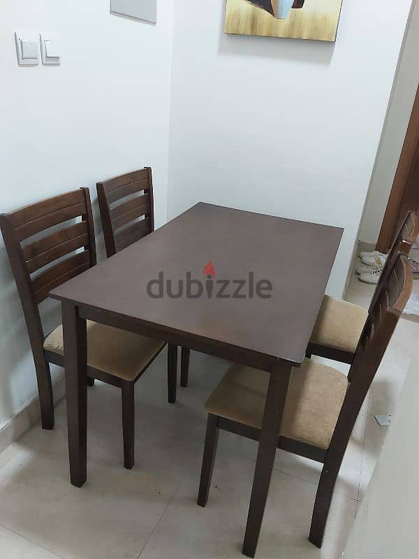 Dining table with 4 chairs ( Almost new ) 1