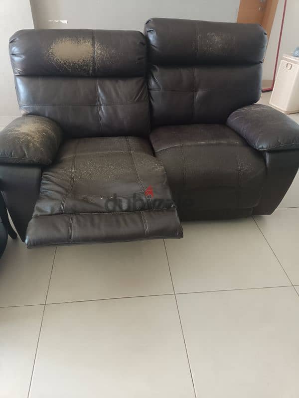 leather double seater recliner sofa in good condition 1