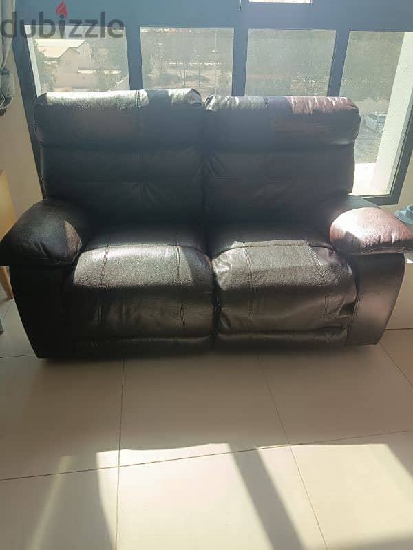 leather double seater recliner sofa in good condition 2