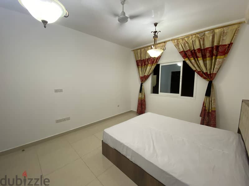 Fully Furnished spacious room with seperate washroom in Al Ghubra 2