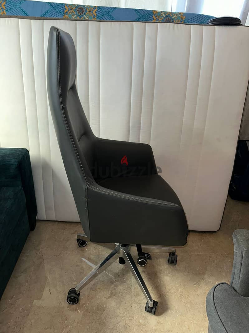 "Grey Office Chair - Perfect Condition! Only 20 OMR" 1