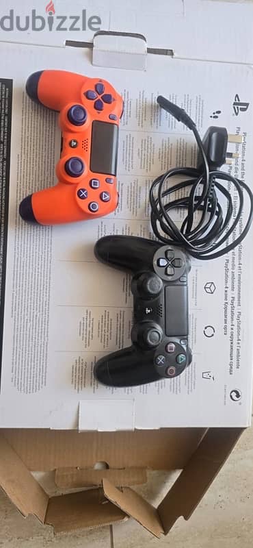 PS4 1TB with 2 controllers - Expat leaving Oman