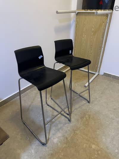 "Set of 2 Black Kitchen Chairs - Great Condition! Only OMR 10!"