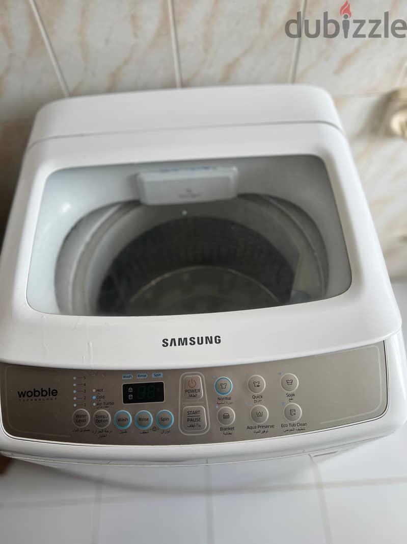 Washing mechine front load 7 month used for sale [ warranty available] 1