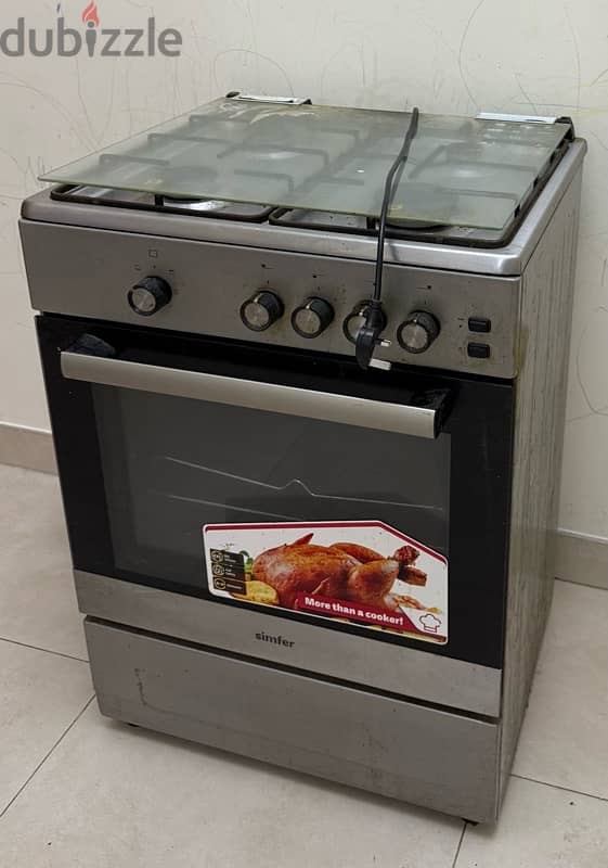 cooking range with Over, Girl’s cycle and Stroller 1