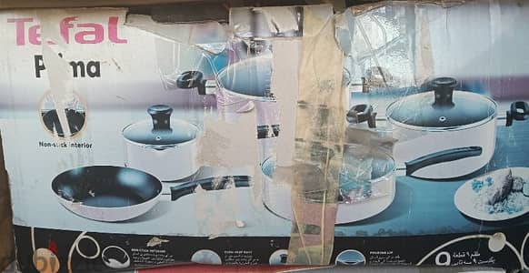 Tefal 9 PCs set and juice extractor for sale.