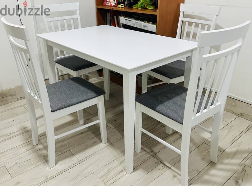 Dining table with 4 chairs very new  and coffee table 13