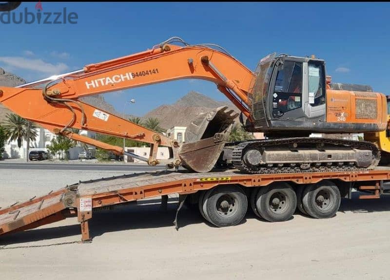 lowbed 18 meter. for rent all over oman. trila . crane . haiup and 3to 2