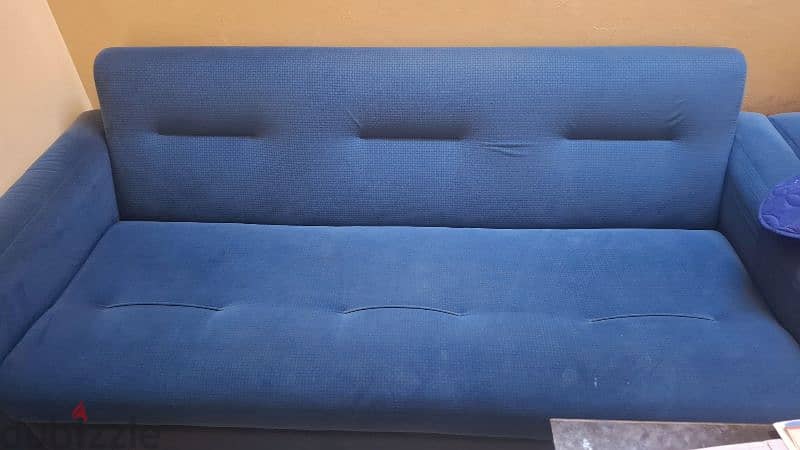 5 seater blue sofa and 5-seater red&black sofa cumbed 3