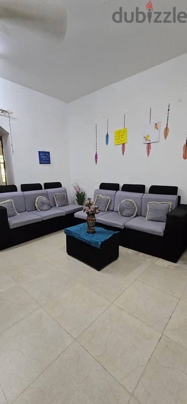 6 seater used sofa with light wear and tear for sale 3