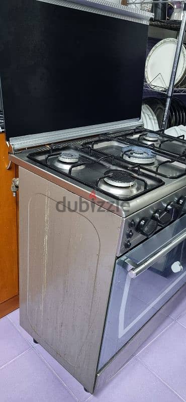 5 burner cooking range for immediate sale