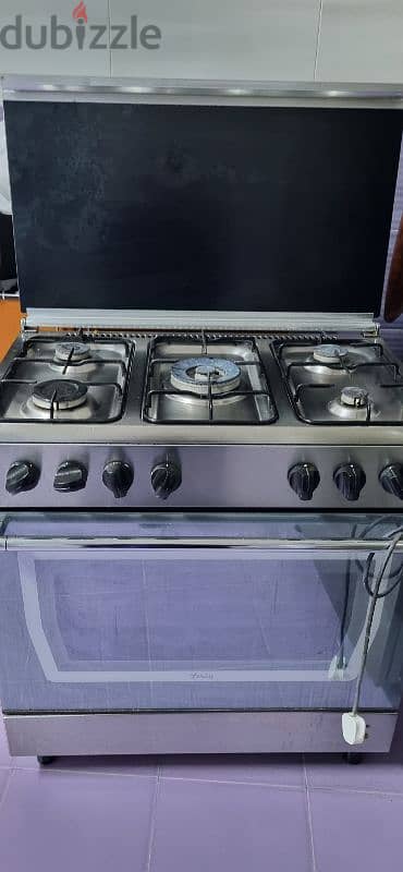 5 burner cooking range for immediate sale 1