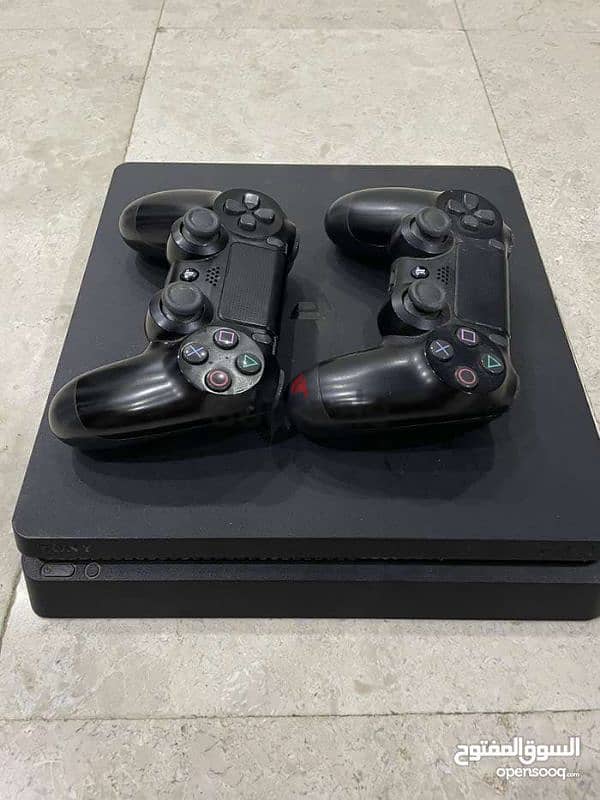 Playstation 4 slim One terabyte storage with 2 controllers interested 0