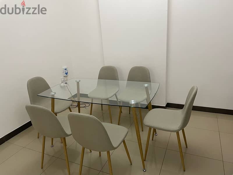 Dinning Table with glass top and 6 chairs 2