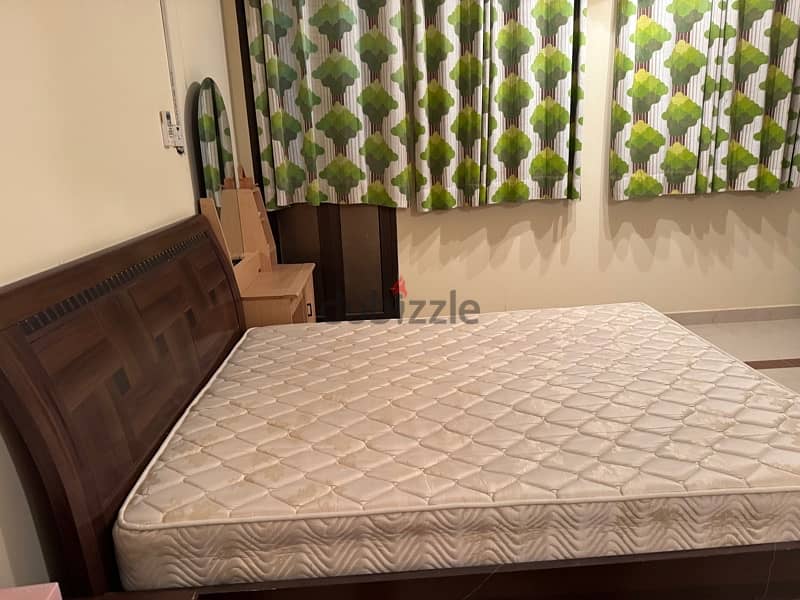 Queen Bed– sturdy and comfortable 1