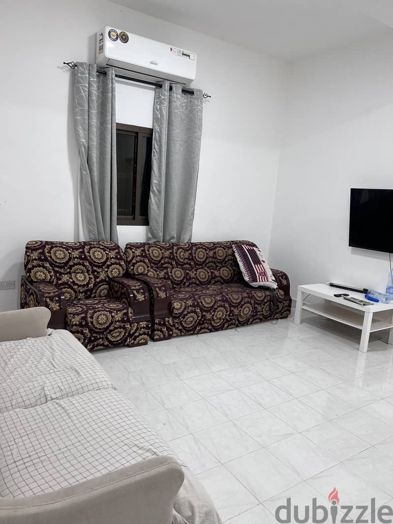 Semi furnished room in 2BHK for Ladies/couple near to Sr Indian school 1