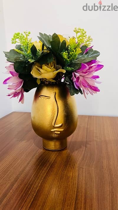 Flower Pot with girl’s face on it