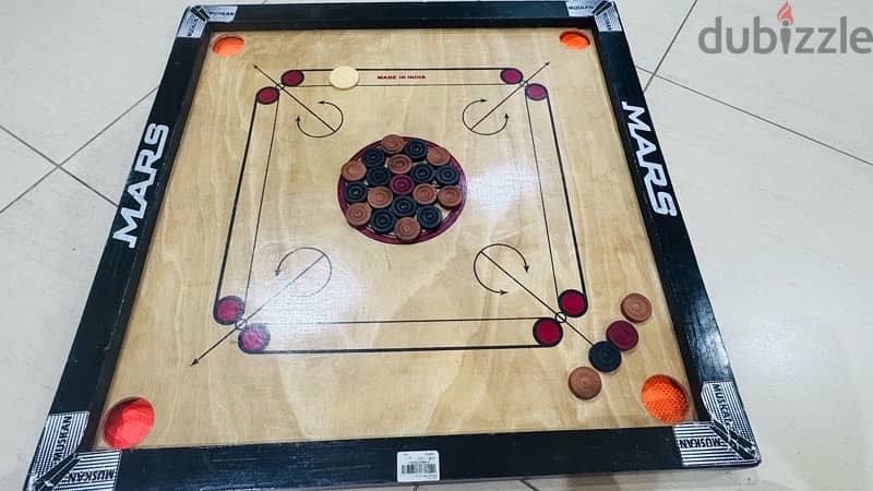 25” Carom Board with extra coins also 1