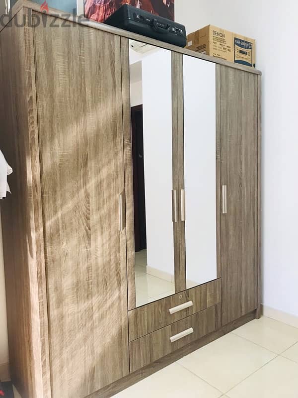 very good condition 4 door cupboard for sale 1