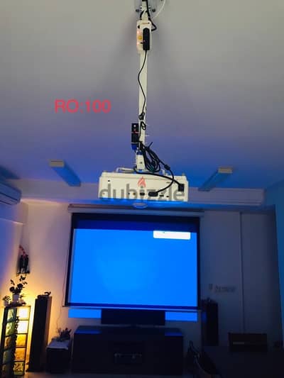 very good condition  projector with screen system