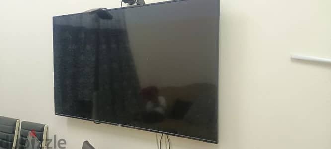 55 inch LCD TV, smart box free with TV. perfect working conditions