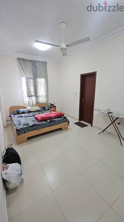 SHARE ROOM IN PRIME ACCESS LOCATION IN RUWI FOR PROFESSIONALS AND STAF