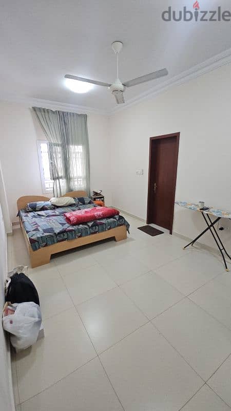 SHARE ROOM IN PRIME ACCESS LOCATION IN RUWI FOR BACHELOURS AND STAFFS 0