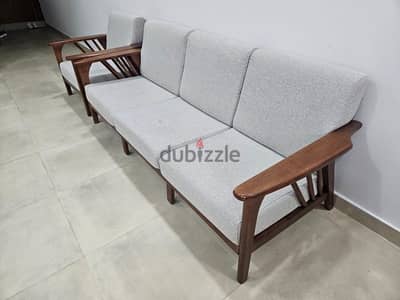 Four sofas with a table