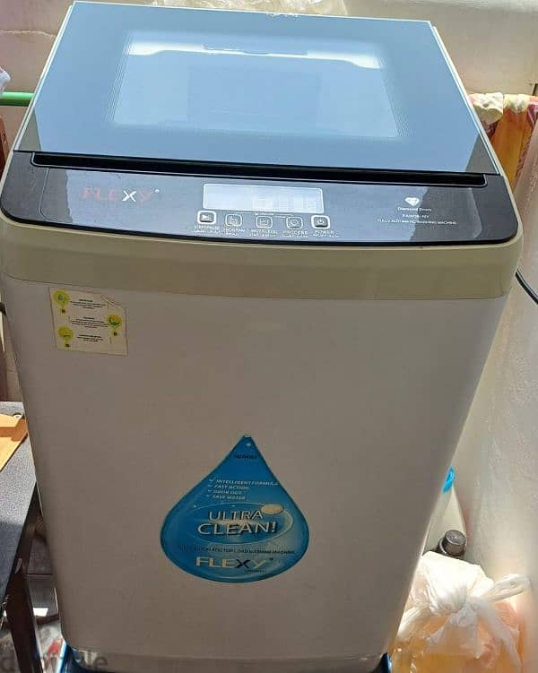 good condition washing machine firdge 1