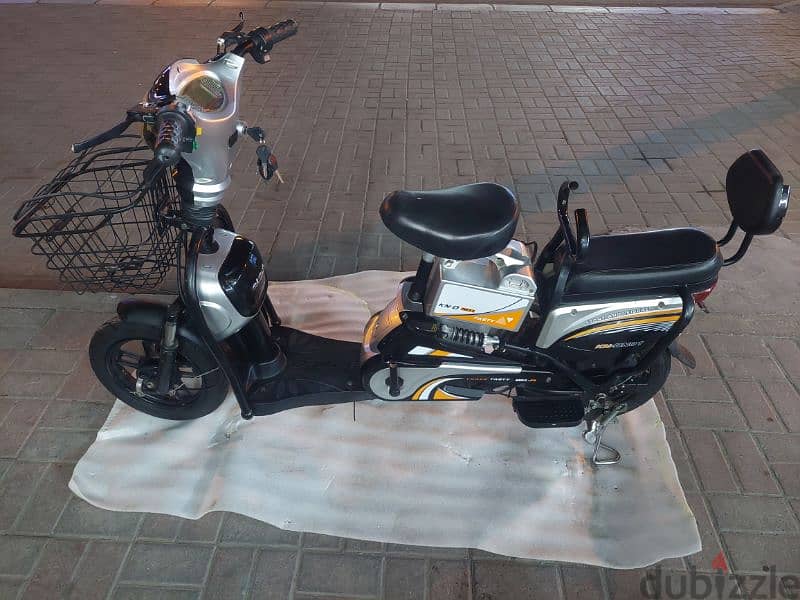 electric scooty size 14 my WhatsApp 97658846 2