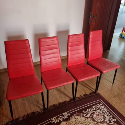 4 Red color chairs