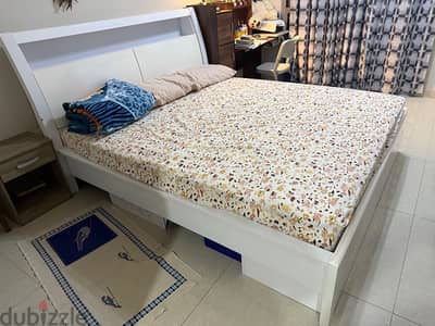 White double bed with storage and mattress