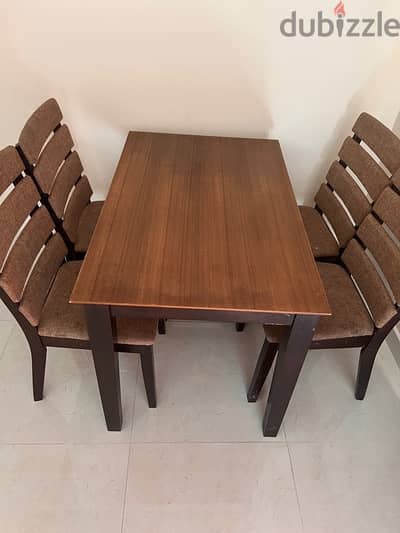 Well maintained 4 seater dining table with chair @25