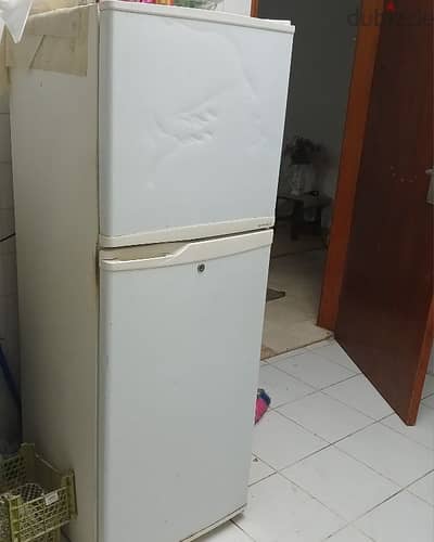 fridge with double door in a good condition  ثلاجه ب ٢ باب بحاله جيده