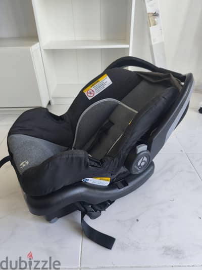 Car Seat for infants and Children with its base, Babytrend Brand.